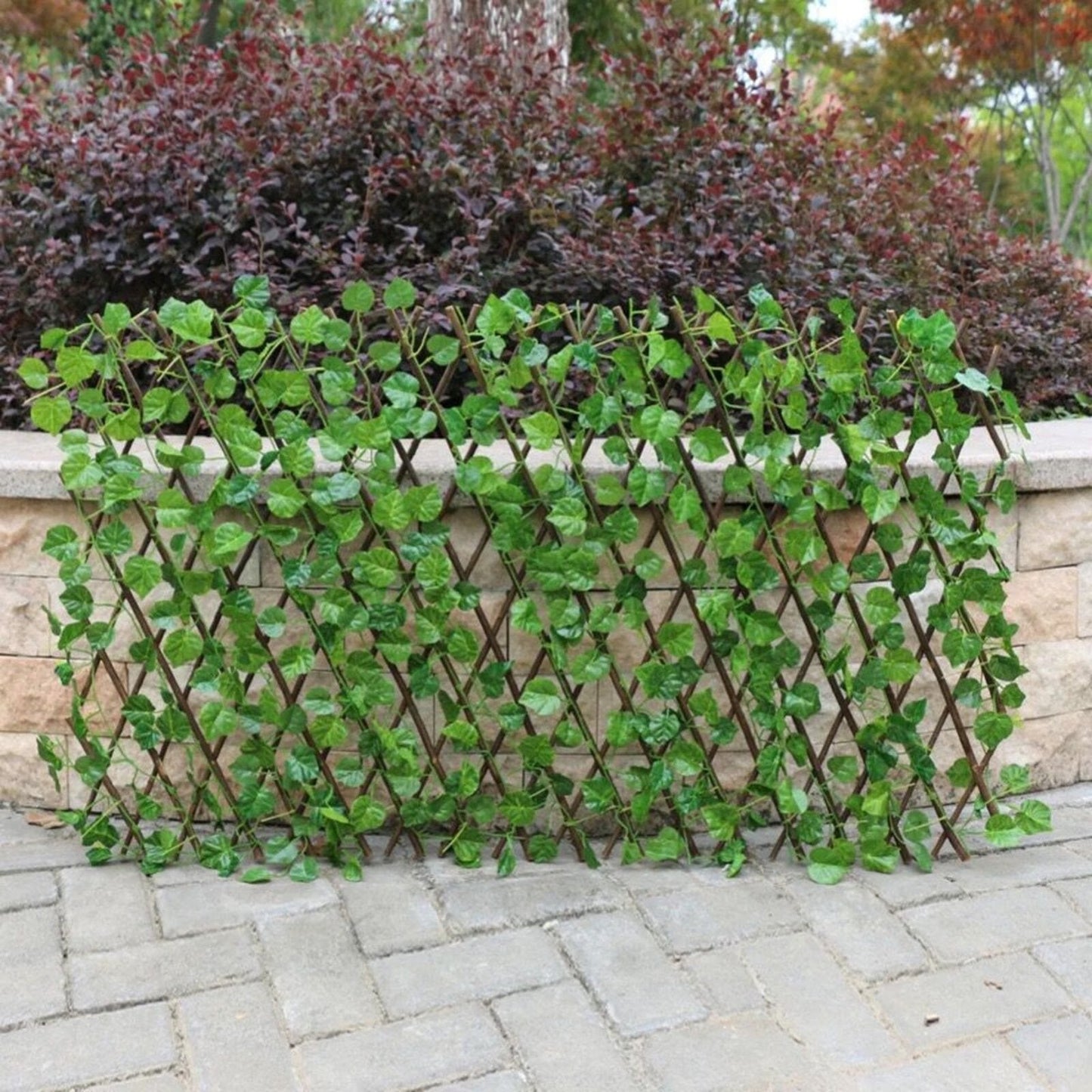 Predlžovací plot vyrobený z umelých rastlín Gardenia